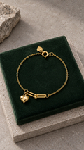 18K gold heart charm bracelet, 18 cm
